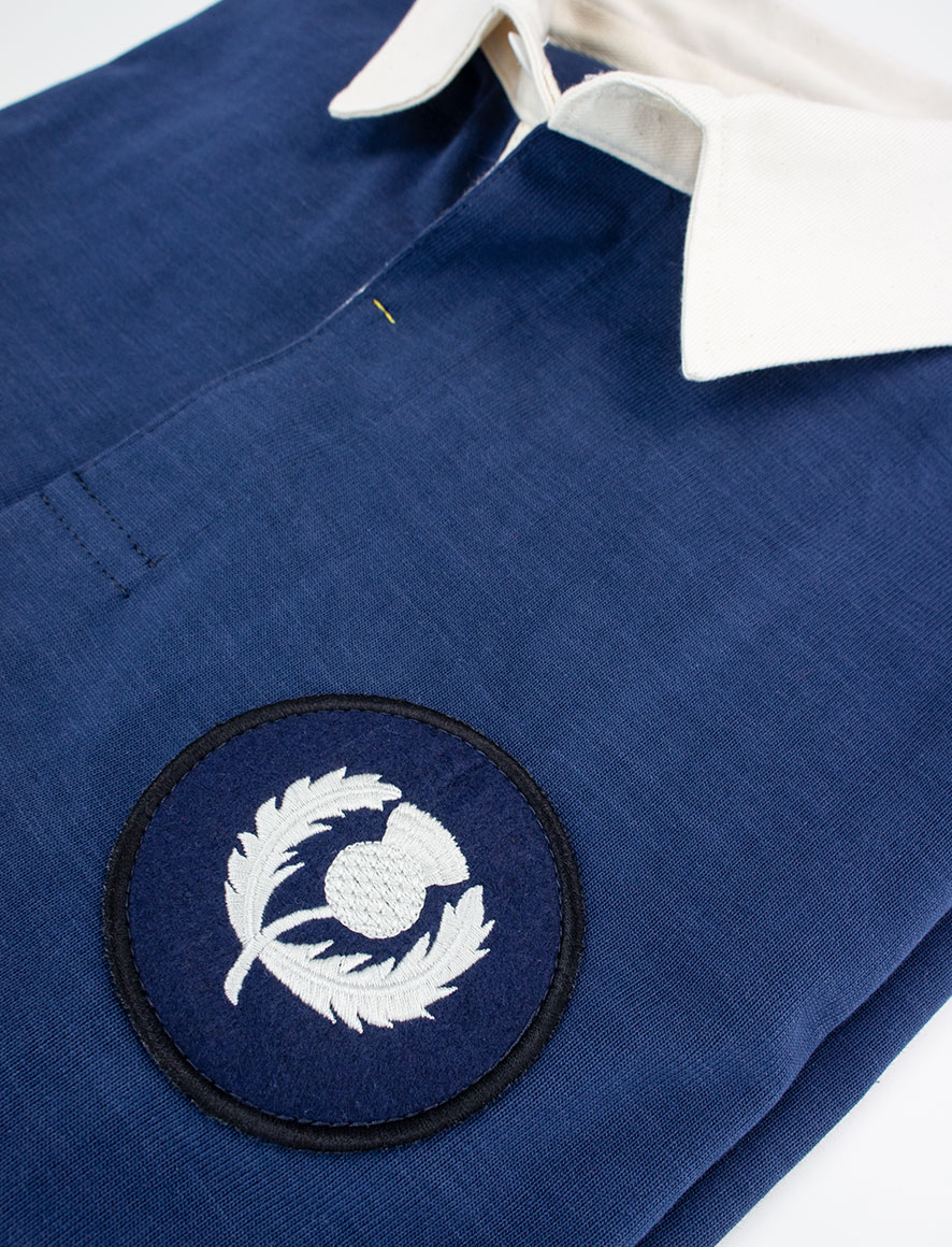 Close up image of Scottish rugby shirt badge