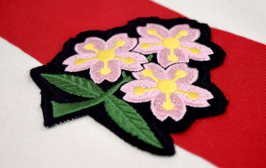 Close up of Japanese sakura embroidered badge
