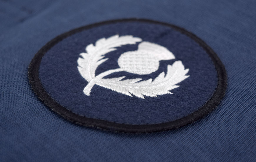 Close up of Scotland thistle badge